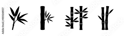 Four bamboo stalks with leaves in black silhouette against a white background showing detail
