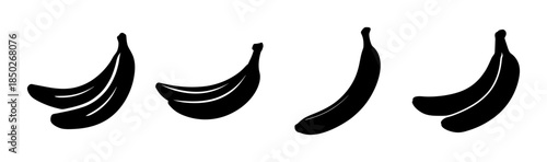 Four stylized black shapes with curved designs and pointed tips arranged on a white background