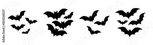 A collection of silhouetted bats in various sizes and orientations arranged in clusters on white background