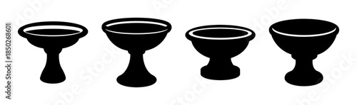 Four stylized menstrual cups in black silhouette with varying sizes and shapes on white background