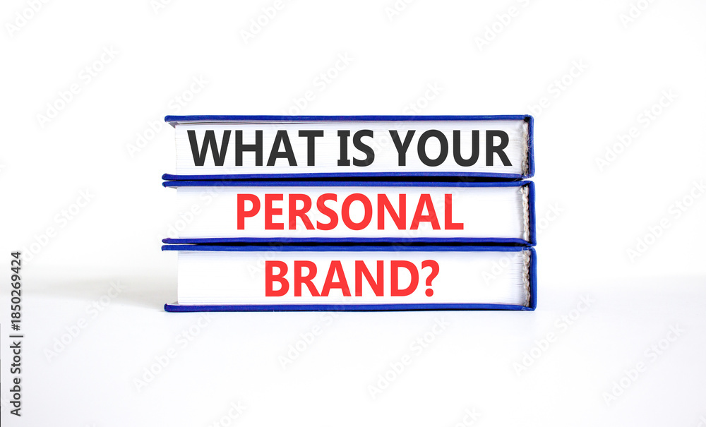 Fototapeta premium What is your personal brand symbol. Concept words What is your personal brand on beautiful books. Beautiful white paper background. Business what is your personal brand concept. Copy space.