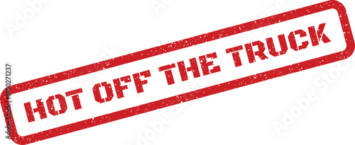 Grunge style red rubber stamp with HOT OFF THE TRUCK text inside a rectangular border, indicating fresh delivery