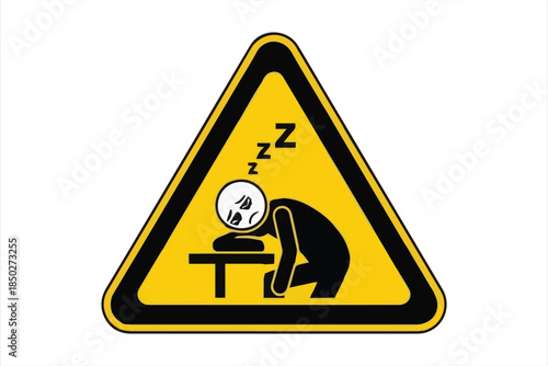 Warning sign depicting a sleeping person at a desk cautioning against drowsiness