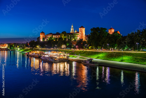 Krakow, Lesser Poland, Poland: Twilight skyline of Wawel Castle and Wawel Cathedral on the shores of river Vistula