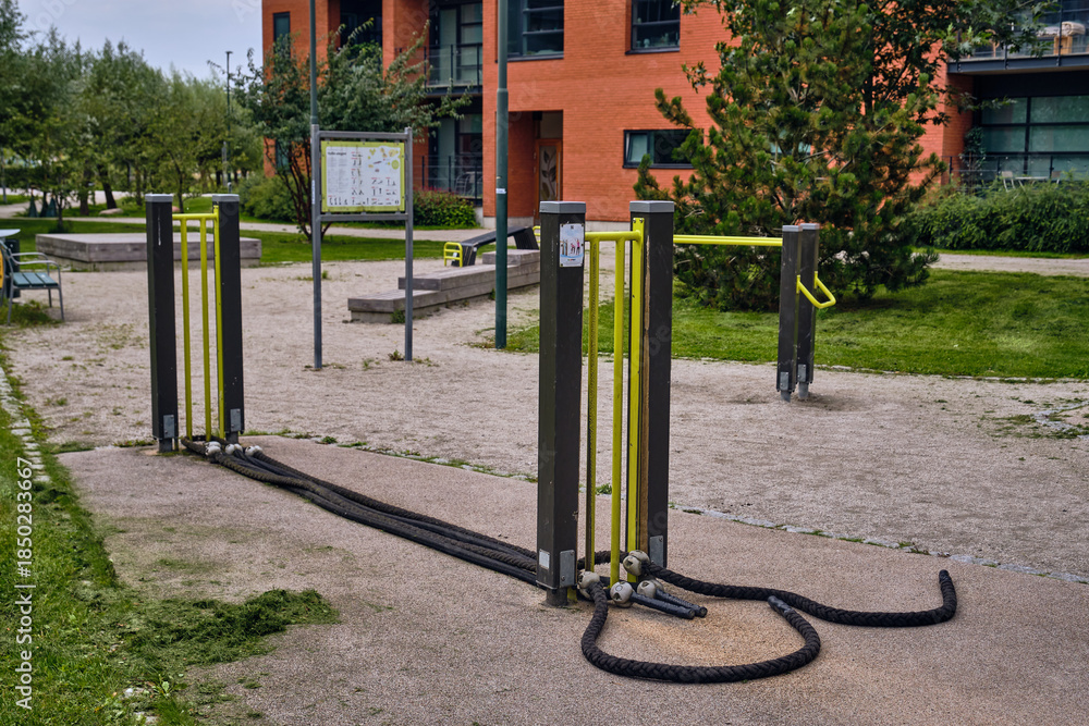 Fototapeta premium Outdoor Fitness Equipment With Ropes In Hyllie Malmo Sweden Modern Urban Design For Sustainable Living And Healthy Lifestyle In Scandinavian City Park