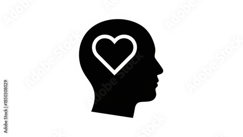 Black silhouette of a human head with a heart in the brain