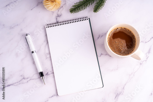 Blank notepad and cup of mocha business concept