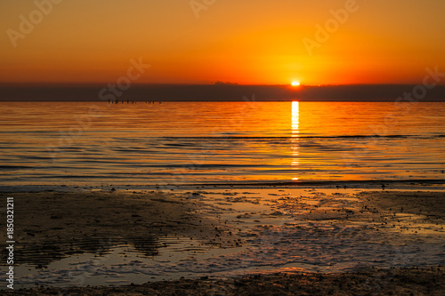 Golden Sunset over Lake Waters