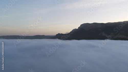 : Aerial Sunrise Above the Clouds at Caminito del Rey, Guadalhorce Lake, and the Pine Forests of Andalusia, Spain