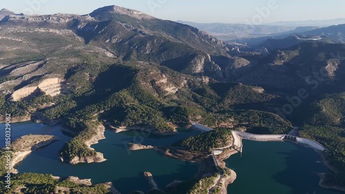 Cinematic Aerial 4K: Sweeping Wide-Angle Sunset Over Guadalhorce Lake, Pine Forests, and the Dramatic Caminito del Rey Gorge in Andalusia