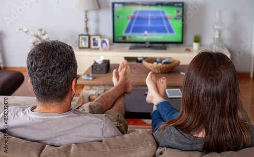 young couple watching tv