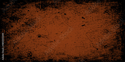 Aged brown grunge texture of an old rusty metal wall featuring a dark grungy surface and antique vintage design pattern with rough weathered paint