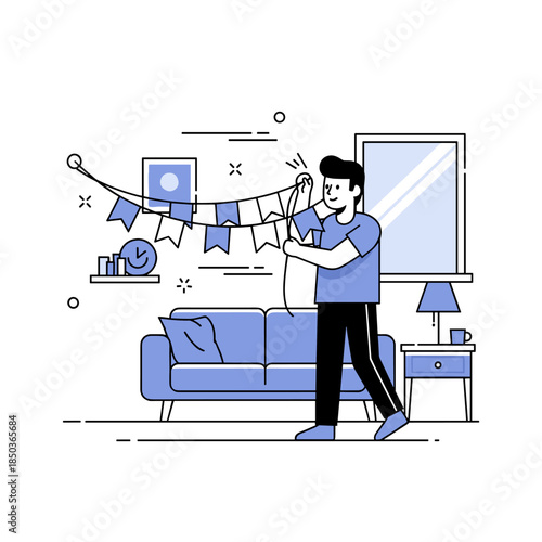 Young caucasian male decorating living room with bunting for a celebration