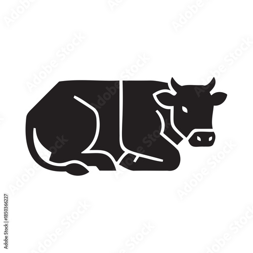 Cow lying down in relaxed pose