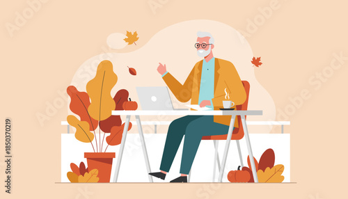 Happy senior man working on laptop outdoors in autumn freelance retirement remote job
