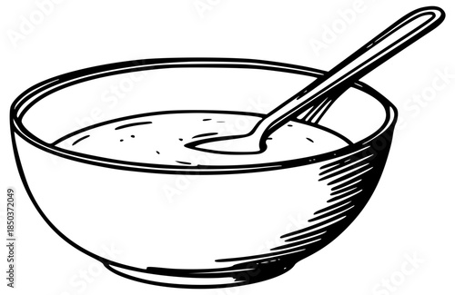 Bowl of porridge with spoon