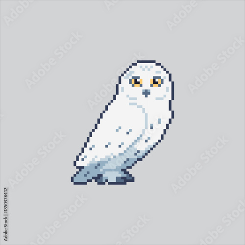 Pixel art illustration Snowy Owl. Pixelated White Owl. White Snowy Owl Bird Icon pixelated for the pixel art game and icon for website and video game. old school retro.