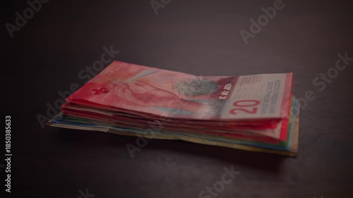 Counting paper money bank notes of swiss francs currency