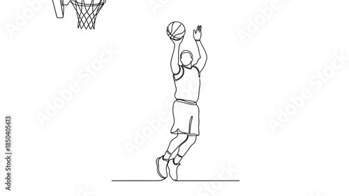 Professional basketball player shooting ball into hoop with dynamic movement