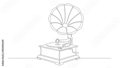 Vintage gramophone on wooden cabinet with horn