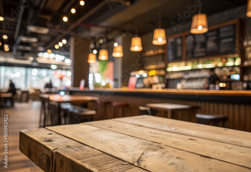 Wallpaper Mural bar interior con efecto glow, mesa de madera en color marrón imagen desenfocada Torontodigital.ca
