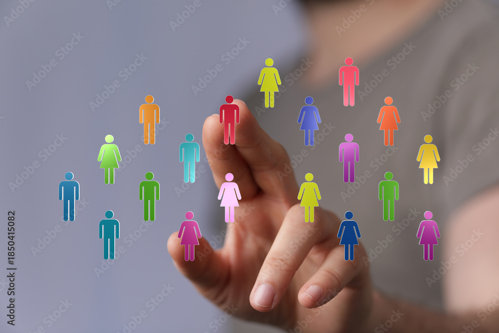 Ταπετσαρία Hand touching colorful icons representing diverse people, teamwork, collaboration, and community engagement