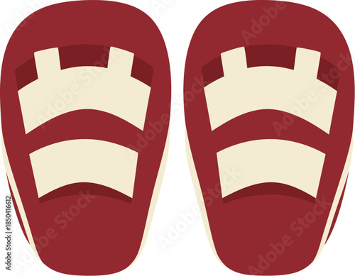 A pair of red and white boxing focus mitts for training.