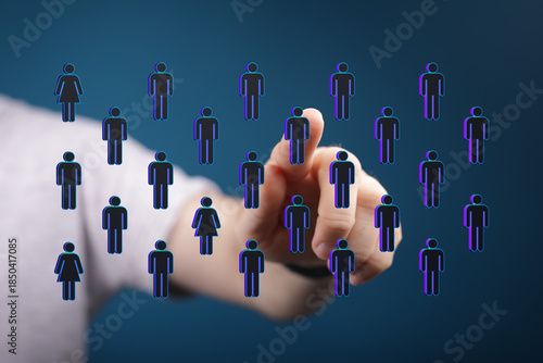 Hand pointing at a person f...
