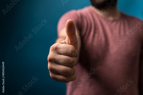 Close-up of a hand with a t...