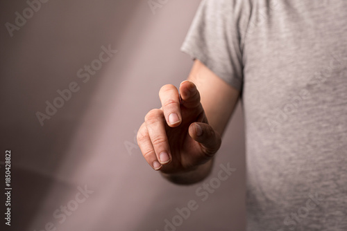 Close-up of a human hand po...