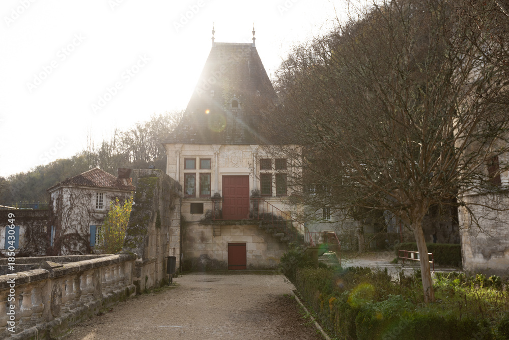 Obraz premium Buildings small vineyard on the Dronne River, Brantome, Brantome-en-Perigord, France