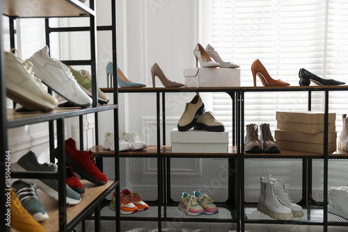 Slika na platnu Many new different pairs of shoes in store