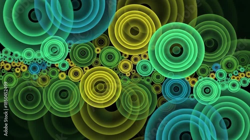 Vibrant green and yellow circles on a dark background with various sizes and colors