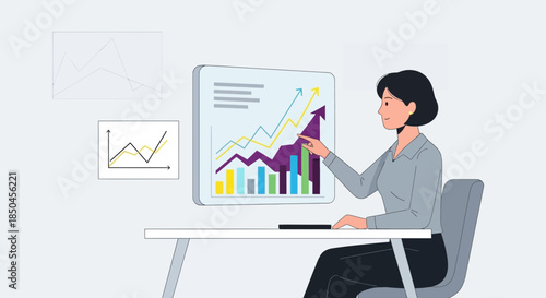 Woman analyzing data on computer screen 2.
