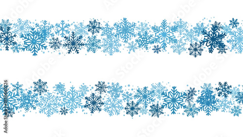 Two horizontal borders of various blue and white snowflakes on a white background