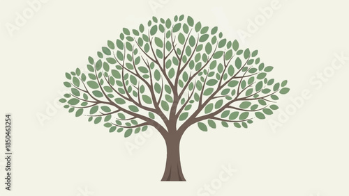 A serene tree with lush green leaves standing alone in a peaceful environment viewed from the side