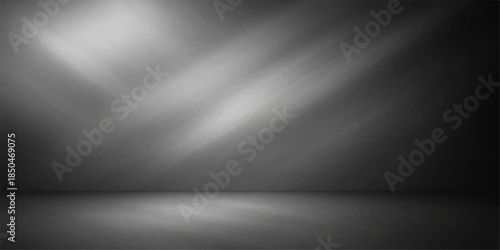 A dark and light gray brushed metal background featuring a polished silver steel texture and a shiny black and white metallic aluminum surface pattern for a modern stainless chrome backdrop design