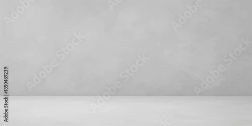 Empty room featuring a dark gray textured concrete wall and floor with a vintage grunge cement pattern for an interior stone backdrop