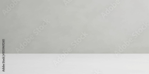 Dark grunge interior featuring a rough grey cement wall and matching floor with a vintage textured stone pattern for a moody architectural backdrop