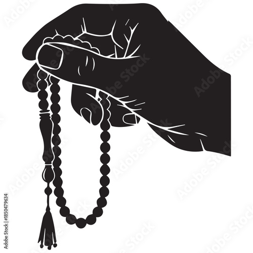 Hand holding prayer beads in contemplative moment