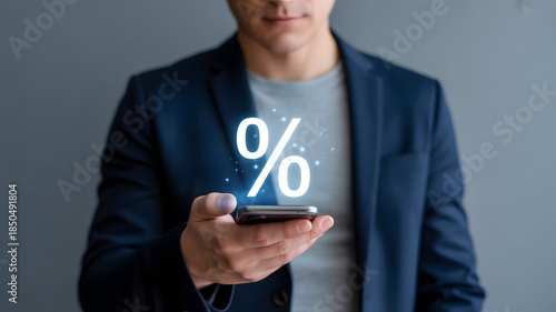 Businessman presenting discount offer on smartphone screen