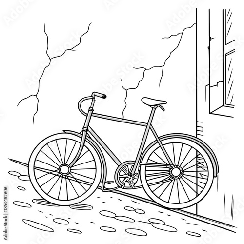 Bicycle leaning against wall in rain