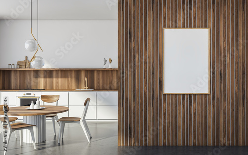Minimalist kitchen interior with wooden furniture, blank frame on slatted wood wall, clean white surfaces, modern design concept. 3D Rendering