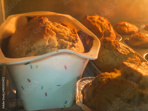 Freshly Baked Sweet Treats in Oven with Golden Brown Crusts
