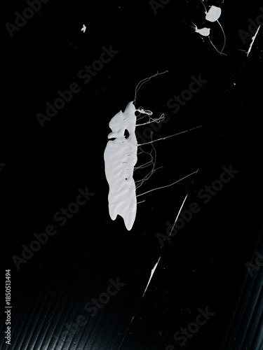 Abstract White Shape on Dark Background Featuring Unique Texture