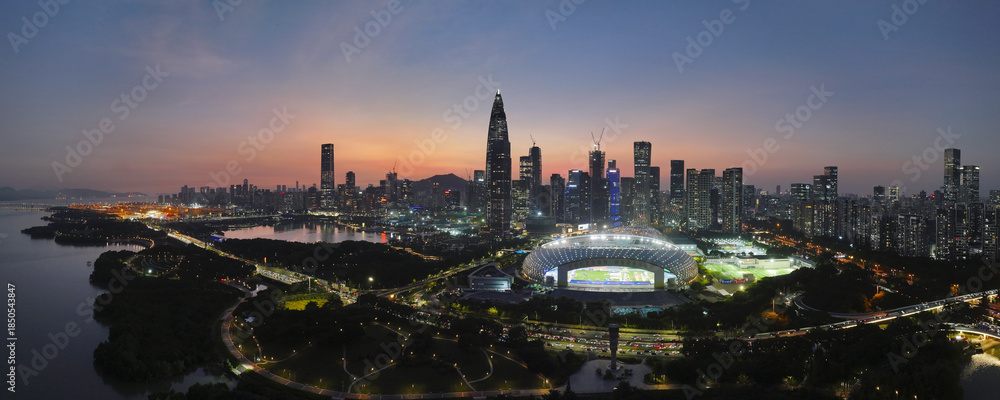 Fototapeta premium Aerial shot of the night view of Talent Park at China Resources Building, Nanshan District, Shenzhen