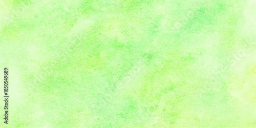 Abstract watercolor and green grunge background featuring aged paper texture and vintage parchment pattern with blank copy space on a light textured antique surface