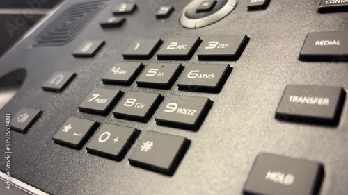 Slow Motion Close-Up of Index Finger Dialing 9-1-1 on Push-Button Phone
