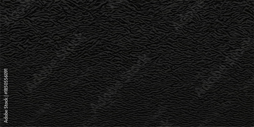 Dark macro black leather texture background featuring a rough vintage material surface with an old textured skin pattern and a gray fabric structure for a dark design wallpaper