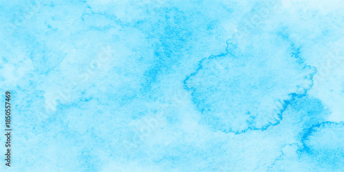 Abstract blue paint texture on a grunge wall creates a cold winter pattern of frozen ice and white clouds across a nature-inspired sky backdrop